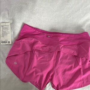 Lululemon Speed Up sonic pink 4in Shorts